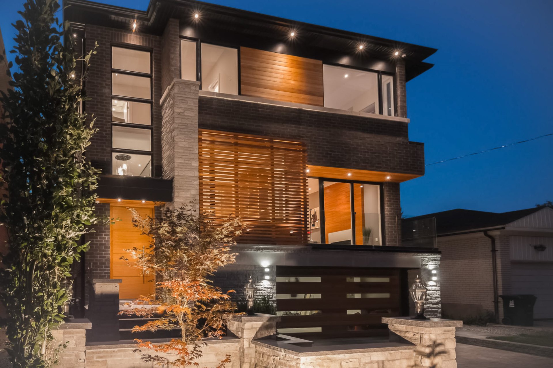 Modern brick home with wooden accents