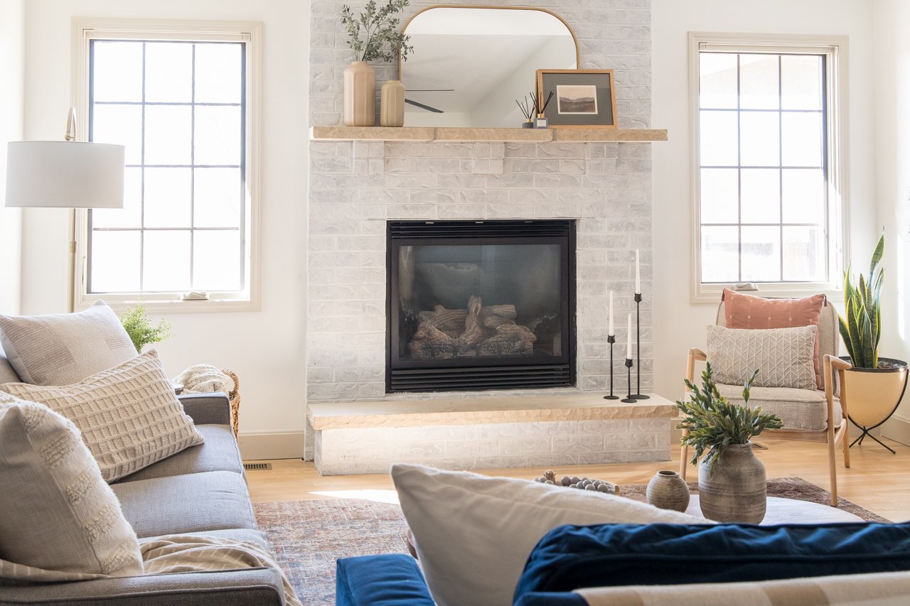 Modern fireplace with white brick surround