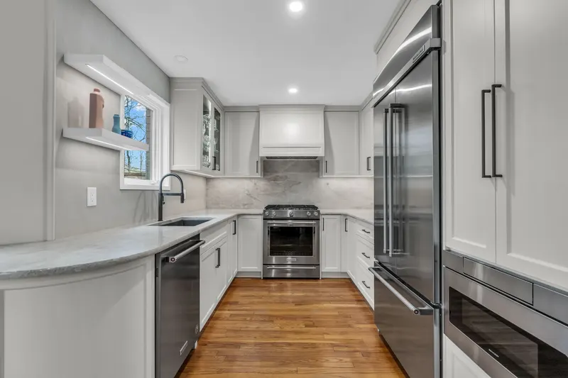 Renovated white kitchen — Strathroy real estate photography by Estate Shutter