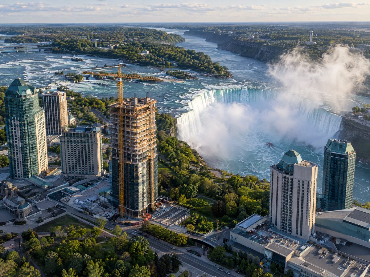 Aerial view of a hotel tower under construction beside the Horseshoe Falls in Niagara Falls
