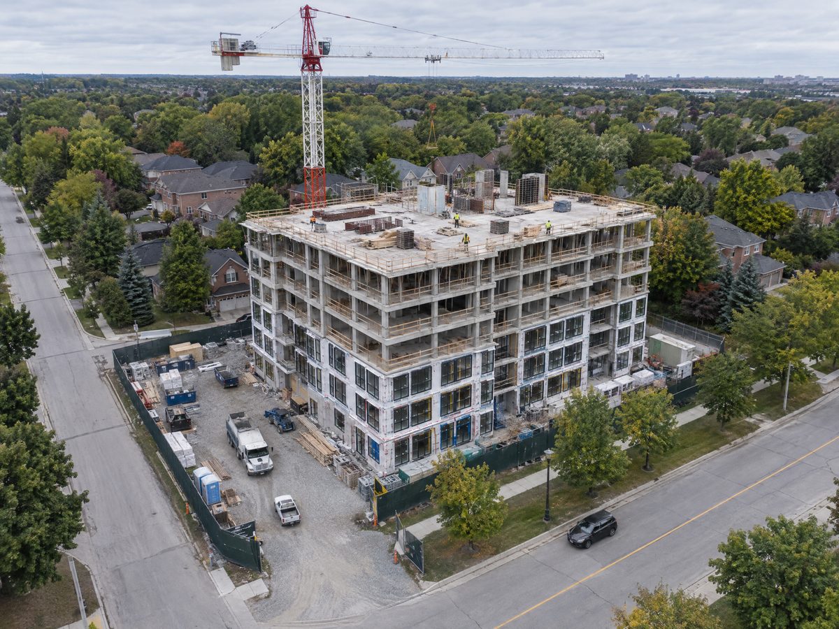 The same aerial view seven months later with a six-storey concrete frame topped out