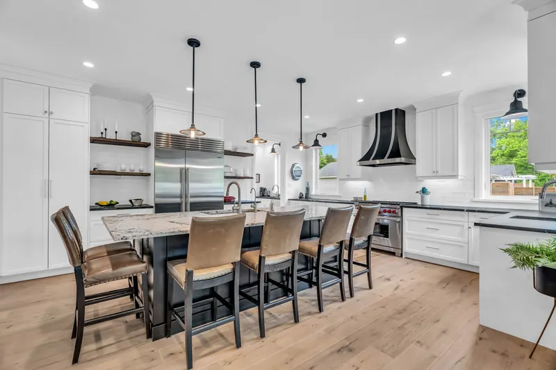 Kitchen with pendant lights and breakfast bar — Grand Bend real estate photography by Estate Shutter