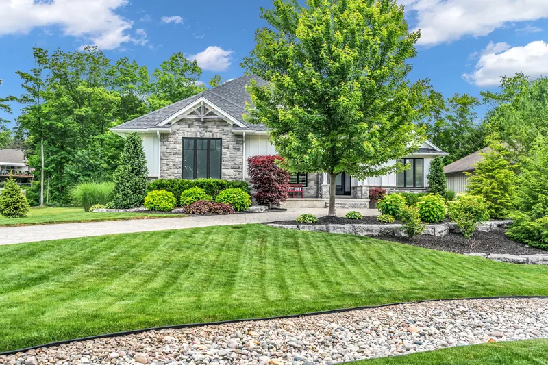 Manicured lawn and paver driveway — Grand Bend real estate photography by Estate Shutter