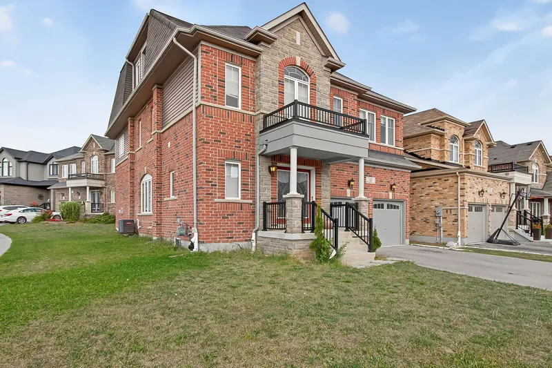 Brick two-storey front elevation — Kitchener real estate photography by Estate Shutter