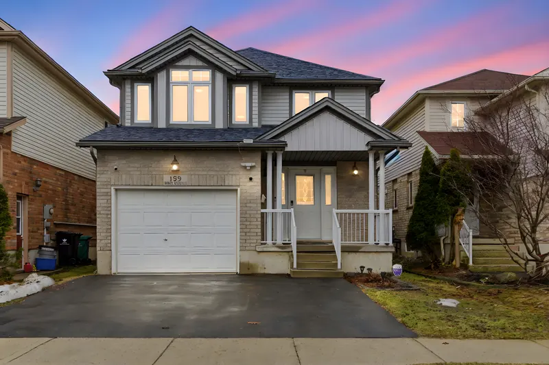 Two-storey home at twilight in Kitchener — twilight real estate photography by Estate Shutter