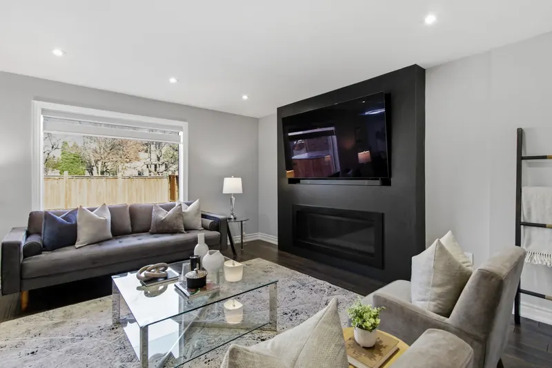 Family room with feature wall — Mississauga real estate photography by Estate Shutter