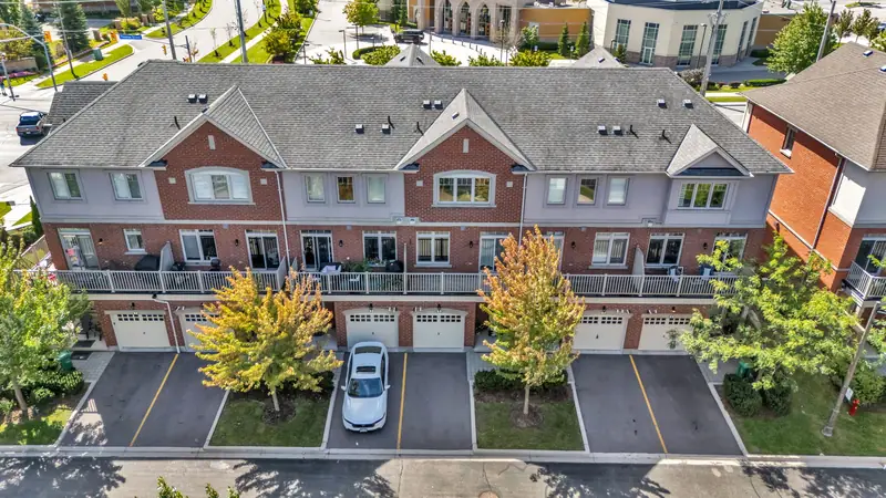 A row of townhome roofs, gables and balconies — drone photo by Estate Shutter, Mississauga, ON