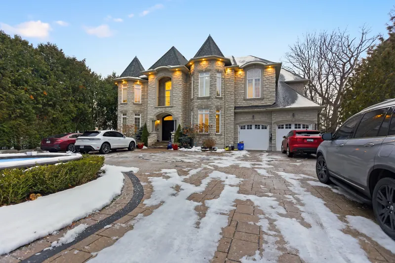Stone chateau at dusk in winter — Pickering real estate photography by Estate Shutter