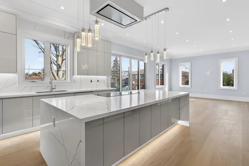 Waterfall island kitchen — Toronto real estate photography by Estate Shutter