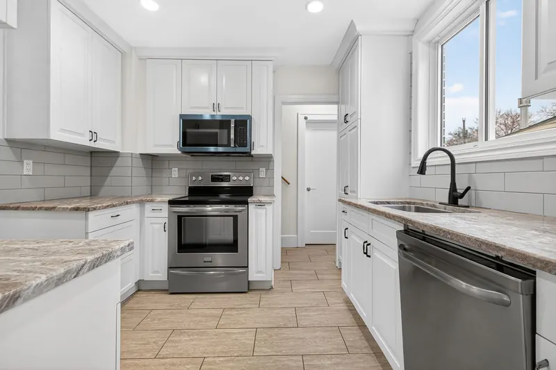 Renovated white kitchen — Windsor real estate photography by Estate Shutter