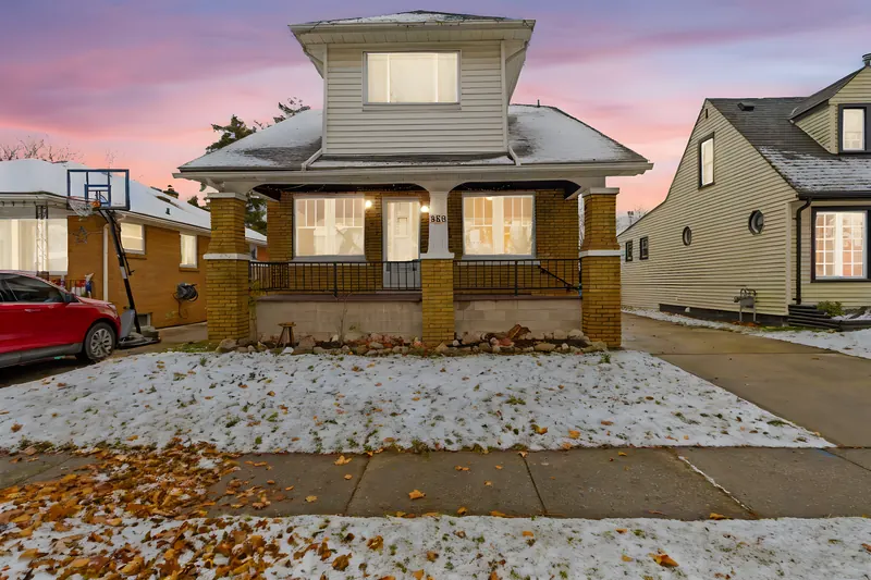 Brick home at twilight in Windsor โ twilight real estate photography by Estate Shutter