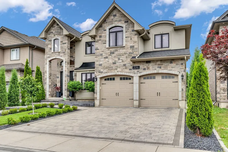 Stone two-storey home in Woodstock — real estate photography by Estate Shutter