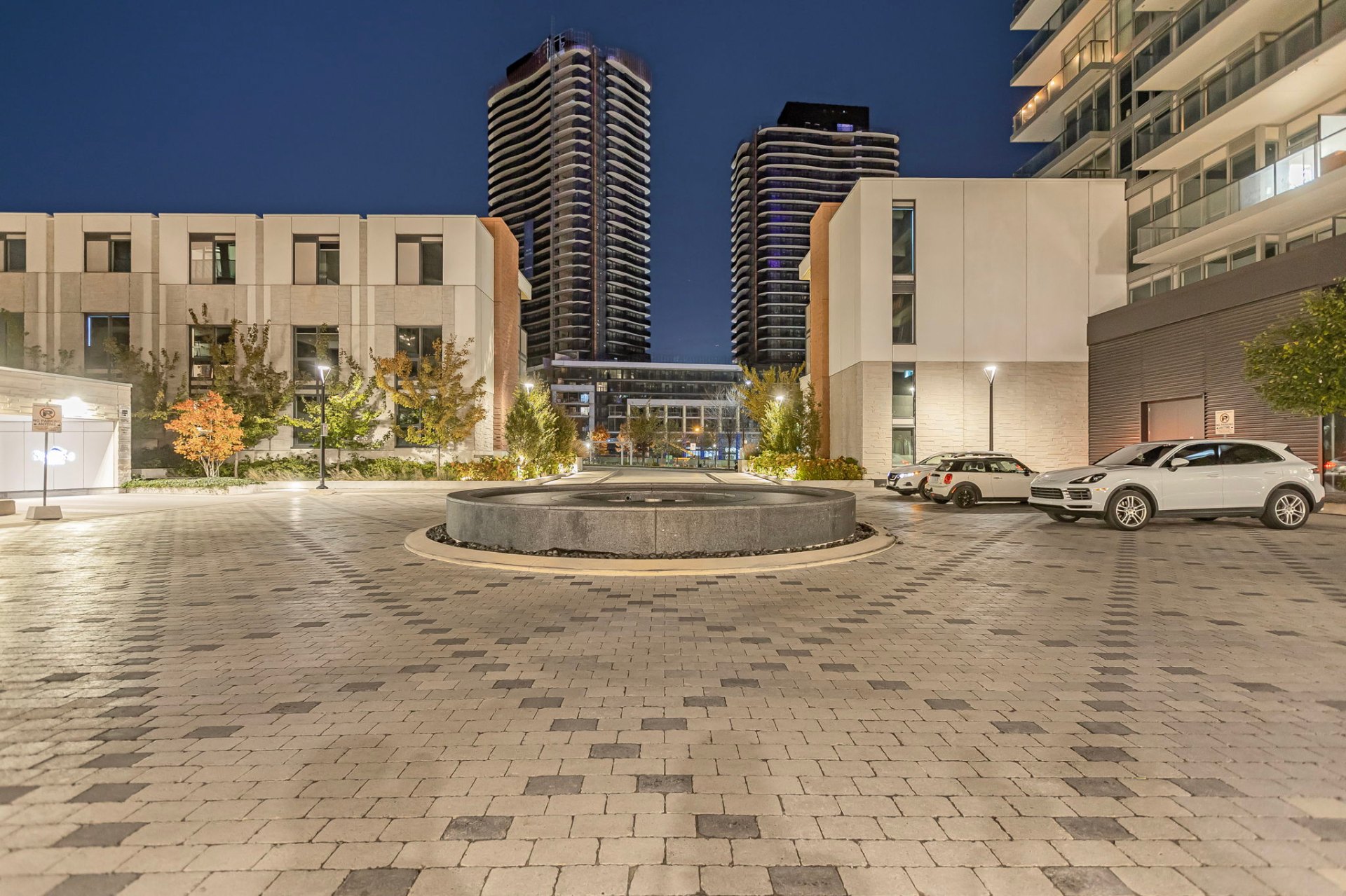 Twilight courtyard with landscaping