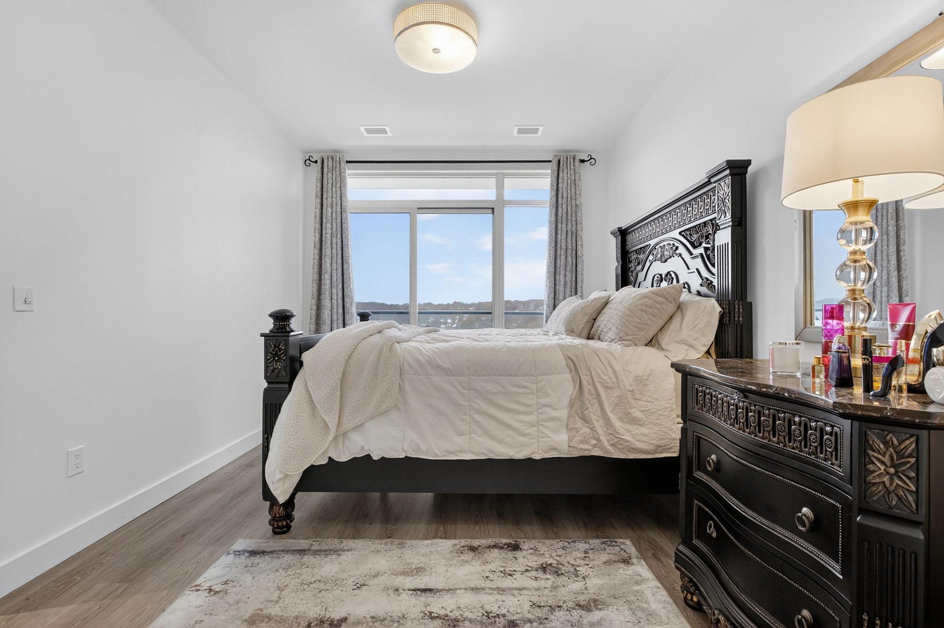 Luxury bedroom with waterfront views